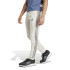Calça adidas Homem Essentials Fleece Tapered Cuff 3-Stripes Bege